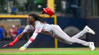 Cincinnati Reds shortstop Elly De La Cruz (44) attempts to steal second base in the first inning against the Milwaukee Brewers but was called out at American Family Field.