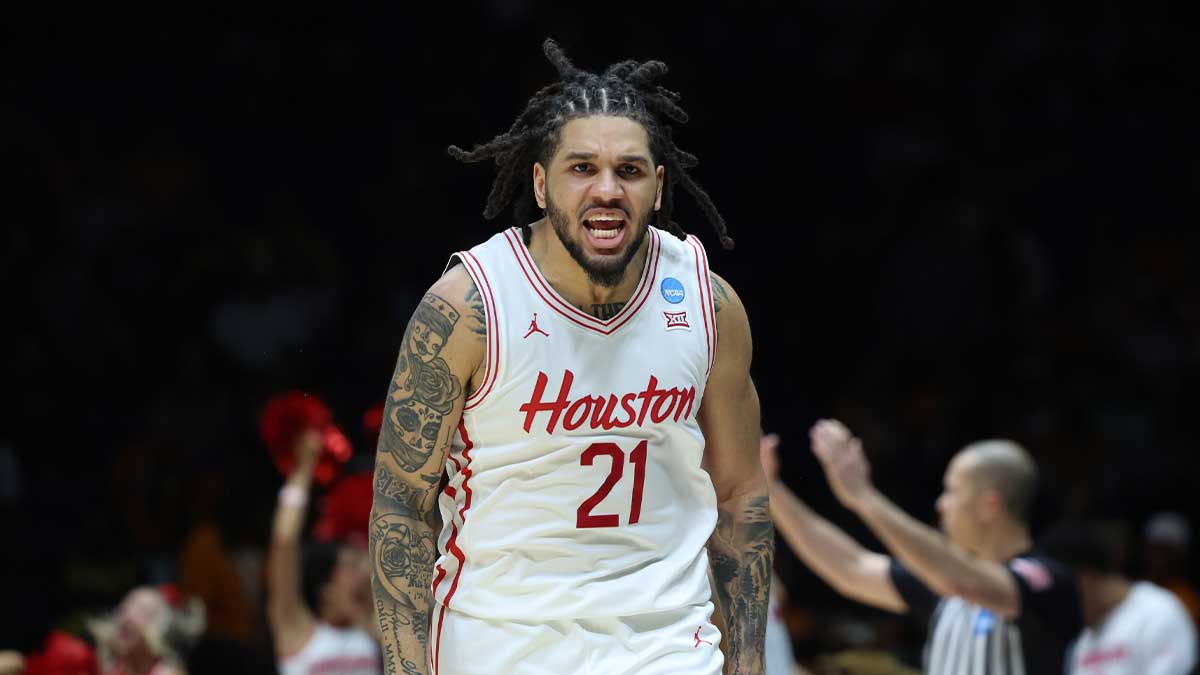 Mar 30, 2025; Indianapolis, IN, USA; Houston Cougars guard Emanuel Sharp (21) reacts against the Tennessee Volunteers in the second half during the Midwest Regional final of the 2025 NCAA tournament at Lucas Oil Stadium.