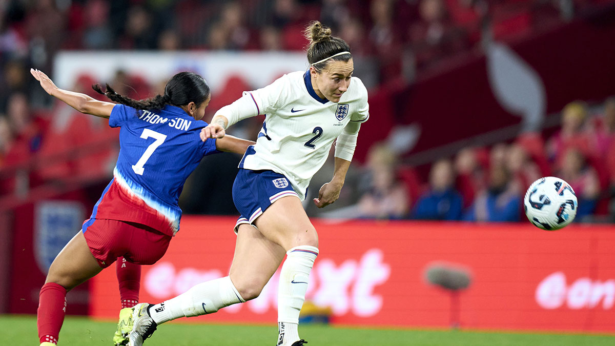 England defender Lucy Bronze (2) gets past United states forward Alyssa Thompson (7) in the first half of an International friendly at Wembley Stadium.