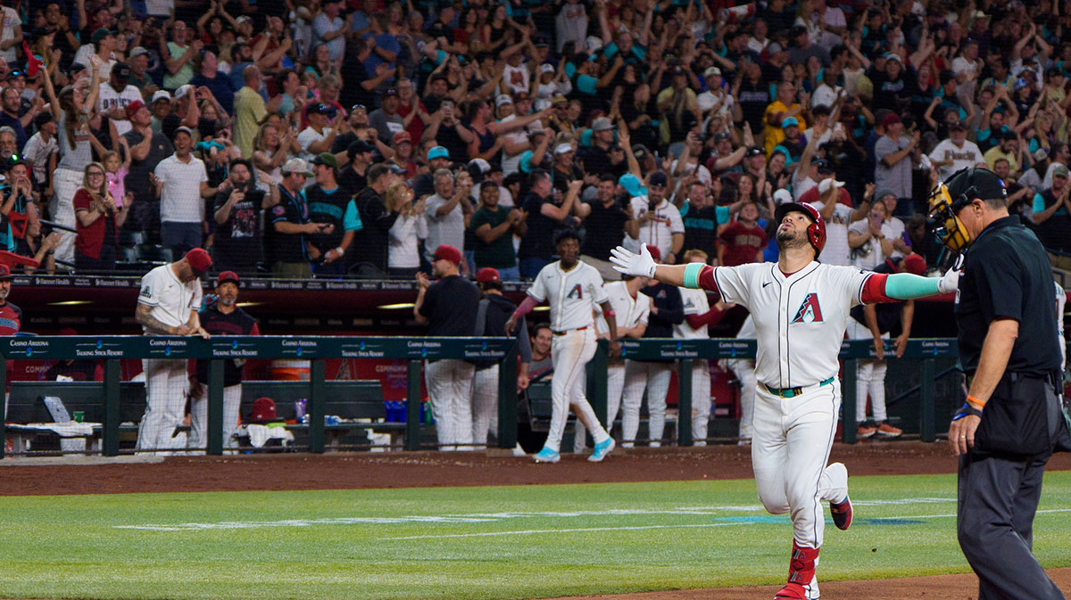Arizona Diamondbacks infielder Eugenio Suarez (28) reacts after hitting his fourth home run of the game against the Atlanta Braves during the ninth inning at Chase Field.