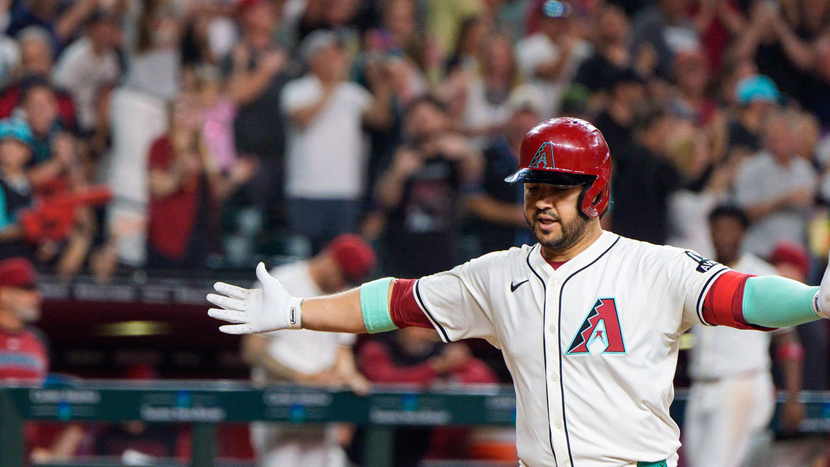 Arizona Diamondbacks infielder Eugenio Suarez (28) reacts after hitting his fourth home run of the game against the Atlanta Braves during the ninth inning at Chase Field.