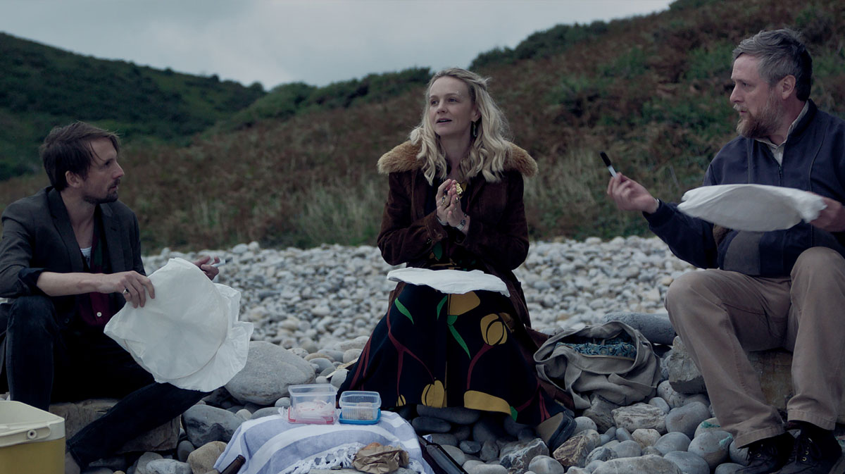 Tim Key, Carey Mulligan, and Tom Basden in Focus Features' The Ballad of Wallis Island.