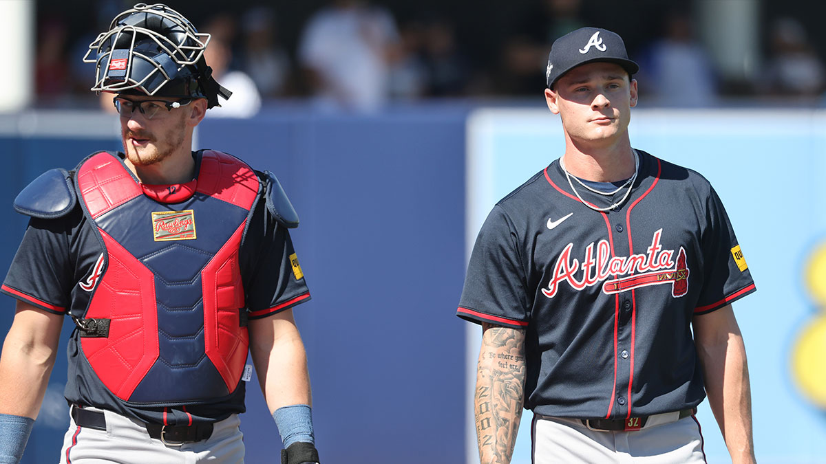 Atlanta Braves starting pitcher AJ Smith-Shawver (32) and catcher Sean Murphy (12) walk to the dugout before the game against the Tampa Bay Rays at George M. Steinbrenner Field.