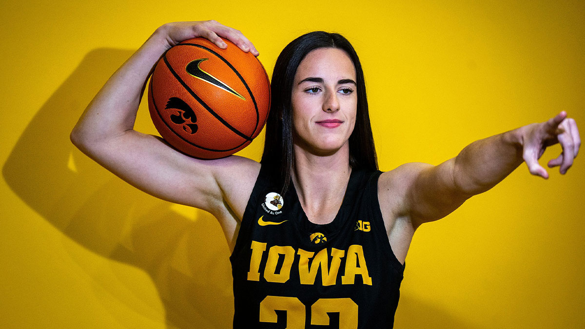 Fever guard Caitlin Clark (22) poses for a photo during Hawkeyes women's basketball media day at Carver-Hawkeye Arena in Iowa City, Iowa.