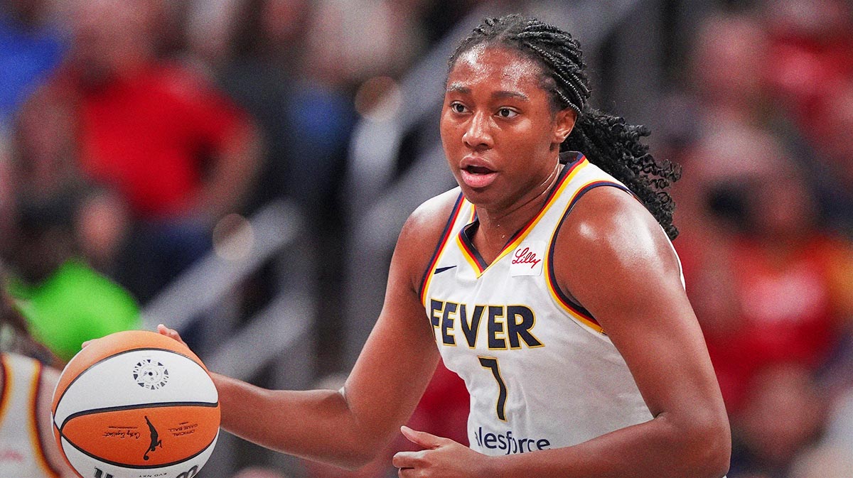 Friday, July 12, 2024 - Indiana Fever forward Aliyah Boston (7) rushes up the court during the game at Gainbridge Fieldhouse in Indianapolis. The Indiana Fever defeated the Phoenix Mercury, 95-86.
