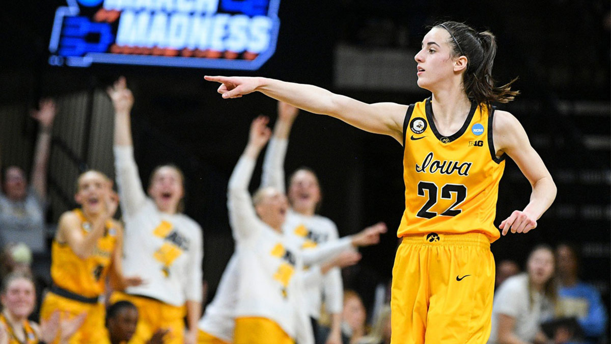 Fever's guard Caitlin Clark (22) and bench celebrates a 3-pointer against Illinois State during the opening round of the Women's NCAA Basketball Tournament at Carver-Hawkeye Arena in Iowa City.