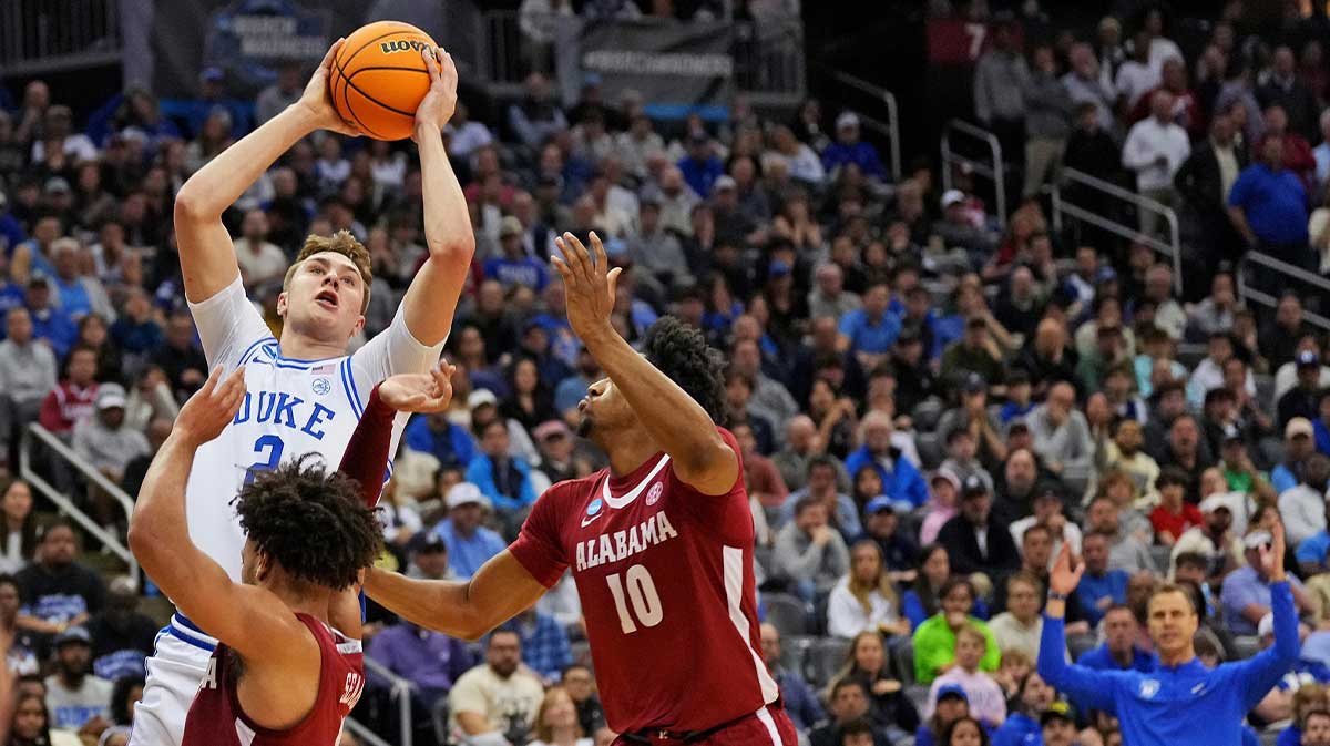 Duke Blue Devils forward Cooper Flagg (2) shoots the ball against Alabama Crimson Tide forward Mouhamed Dioubate (10) during the second half in the East Regional final of the 2025 NCAA tournament at Prudential Center.
