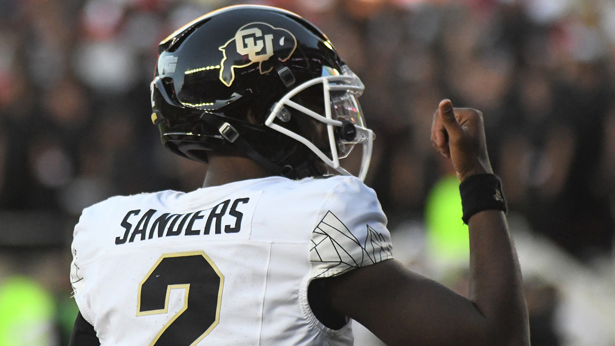 Colorado's Shedeur Sanders gestures after a touchdown against Texas Tech in a Big 12 football game.