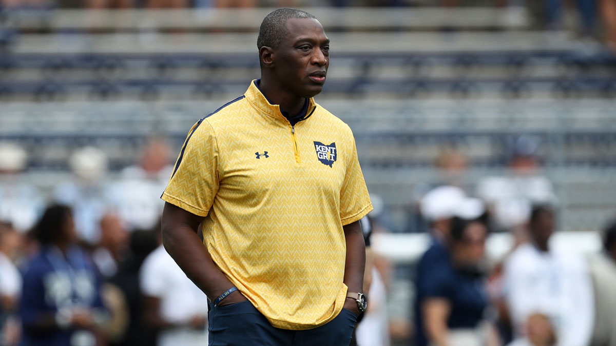 Kent State Golden Flashes head coach Kenni Burns looks on from the field during a warmup prior to the game against the Penn State Nittany Lions at Beaver Stadium.