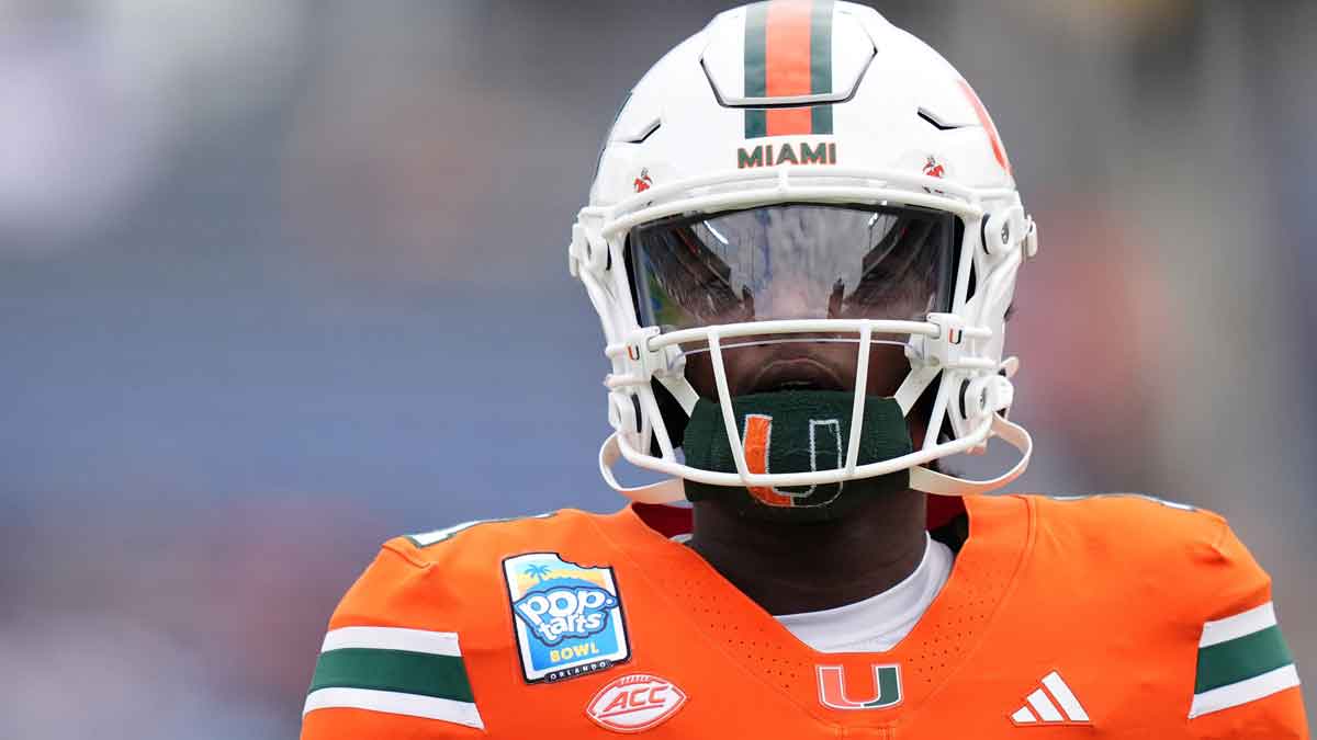Miami Hurricanes quarterback Cam Ward (1) warms up prior to the game against the Iowa State Cyclones at Camping World Stadium.
