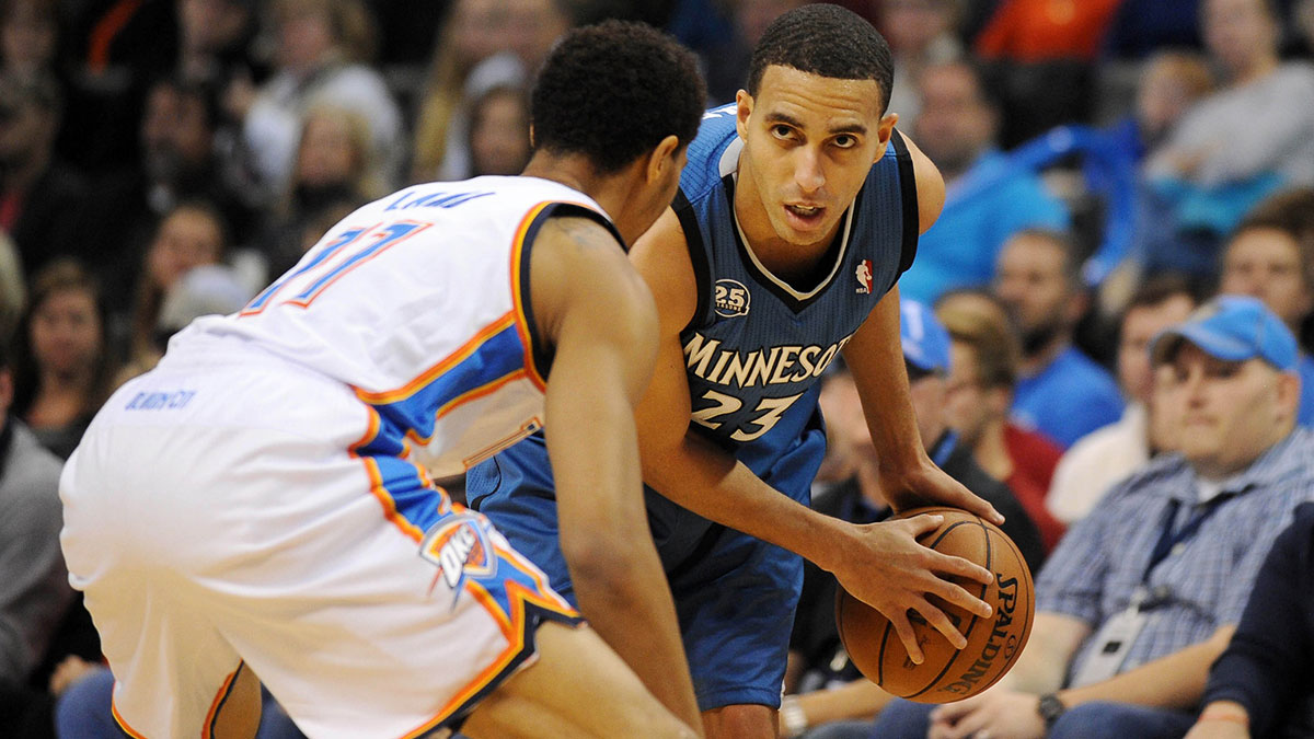 Minnesota Timberwolves shooting guard Kevin Martin (23) handles the ball against Oklahoma City Thunder shooting guard Jeremy Lamb (11) during the first quarter at Chesapeake Energy Arena.