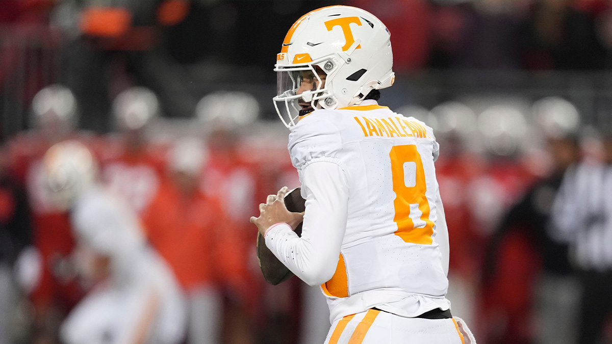 Tennessee quarterback Nico Iamaleava (8) looks for an open receiver during the NCAA college football playoff game against Ohio State.