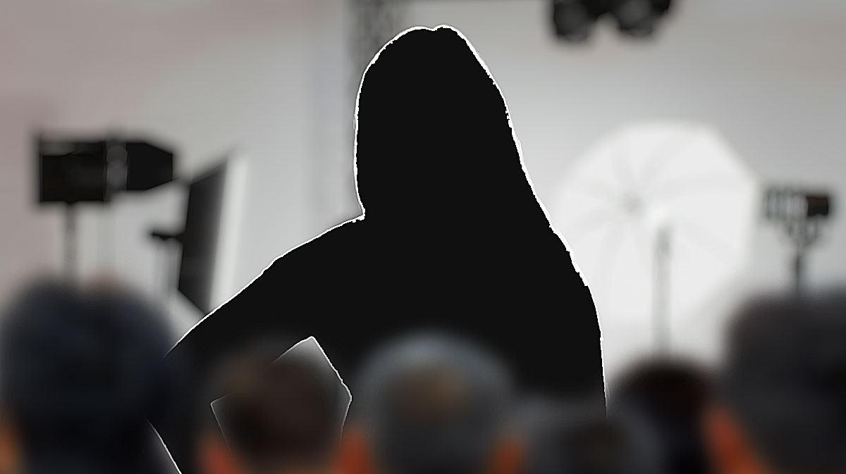 Former WWE Women's World Champion Liv Morgan as a silhouette on a movie set.
