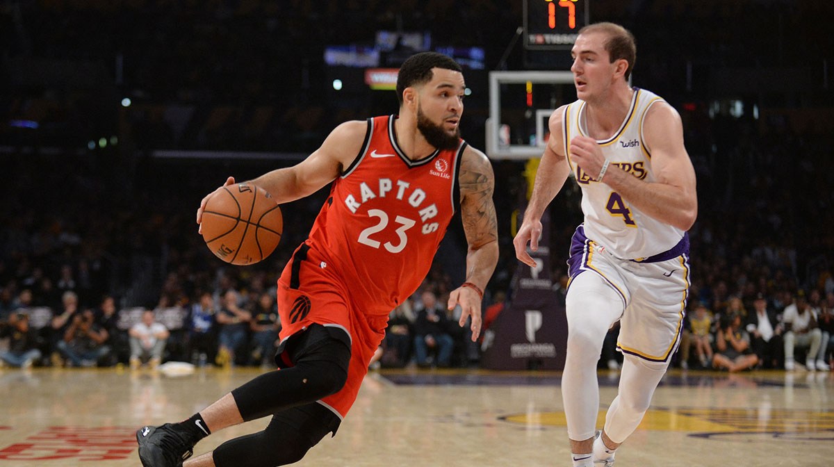 Toronto Raptors guard Fred VanVleet (23) moves the ball against Los Angeles Lakers guard Alex Caruso (4) during the first half at Staples Center.