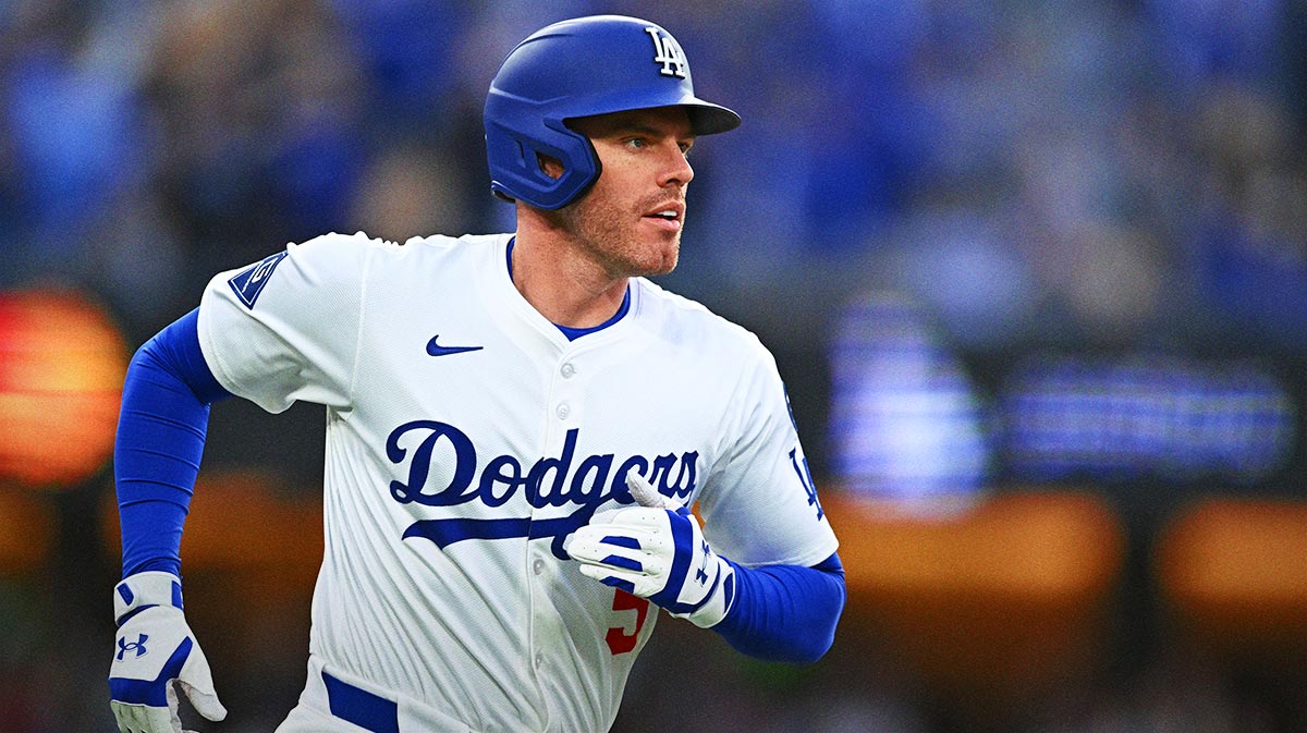 Los Angeles Dodgers first baseman Freddie Freeman (5) hits a home run during the 1st inning against the Detroit Tigers at Dodger Stadium.