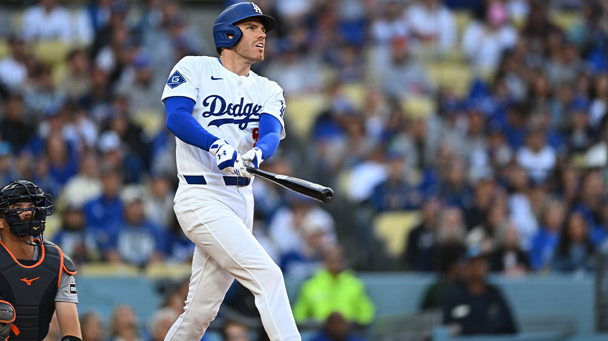 Los Angeles Dodgers first baseman Freddie Freeman (5) hits a home run during the 1st inning against the Detroit Tigers at Dodger Stadium.