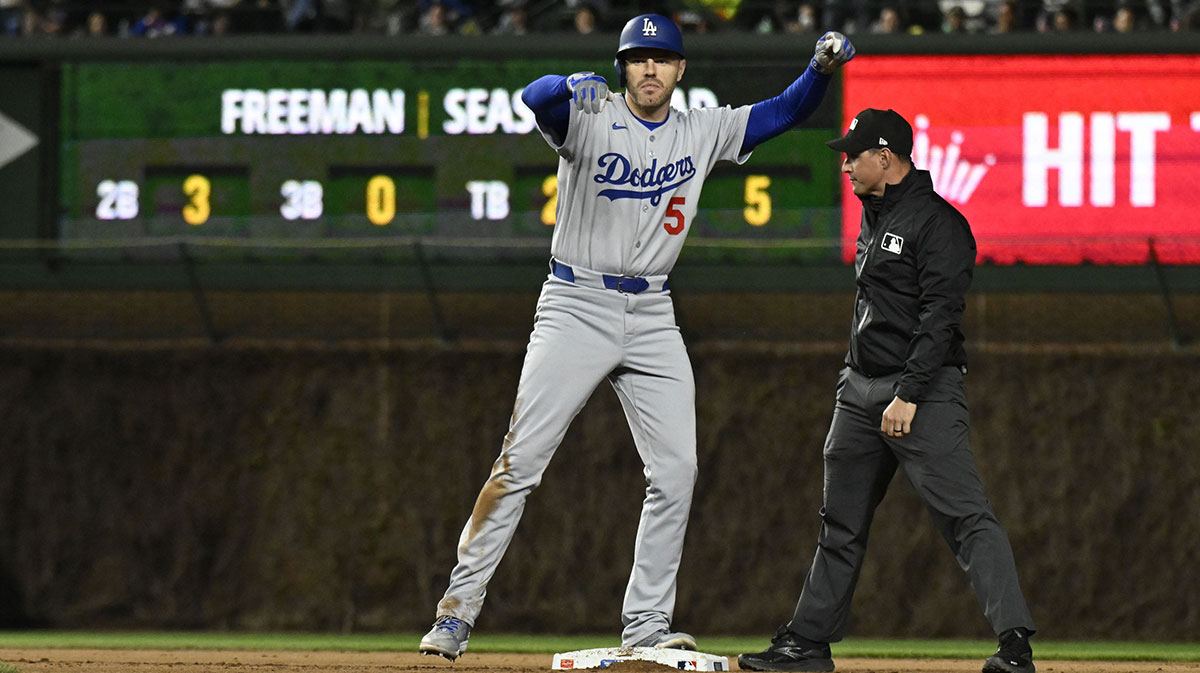 Los Angeles Dodgers first baseman Freddie Freeman (5) after he hits a two RBI double during the seventh inning against the Chicago Cubs at Wrigley Field.