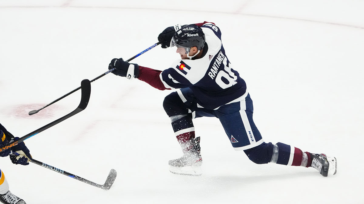 Colorado Avalanche left wing Gabriel Landeskog (92) shoots the puck in the third period against the St. Louis Blues at Ball Arena.