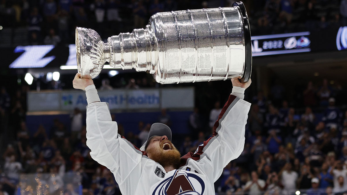 Colorado Avalanche left wing Gabriel Landeskog (92) celebrates with the Stanley Cup after the game against the Tampa Bay Lightning in game six of the 2022 Stanley Cup Final at Amalie Arena.