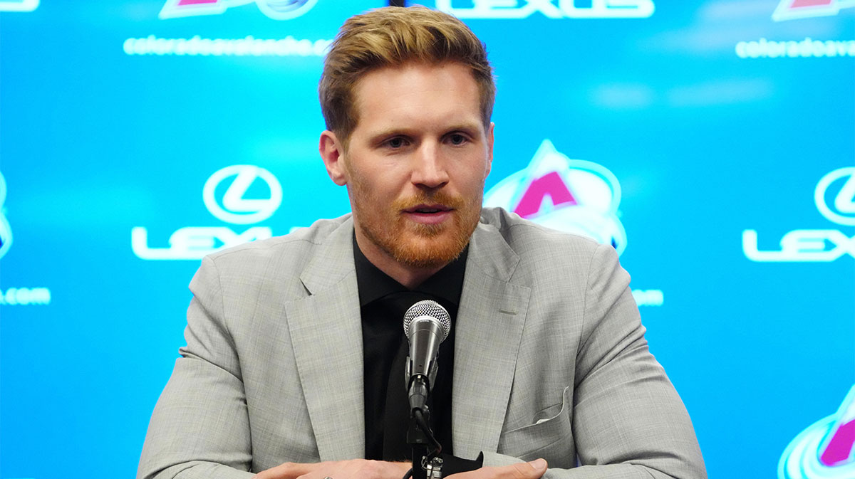 Colorado Avalanche left wing Gabriel Landeskog (92) speaks to the media before the game at Ball Arena.