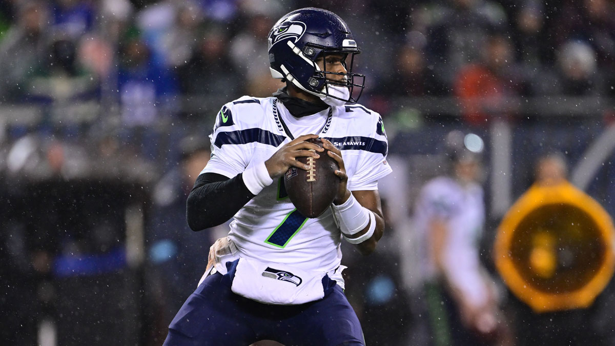 Seattle Seahawks quarterback Geno Smith (7) looks to pass against the Seattle Seahawks during the third quarter at Soldier Field.