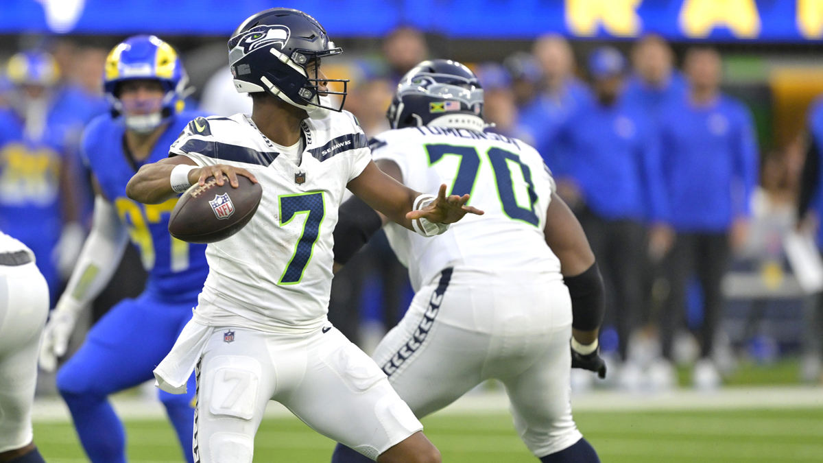 Seattle Seahawks quarterback Geno Smith (7) sets to pass against the Los Angeles Rams in the first half at SoFi Stadium.