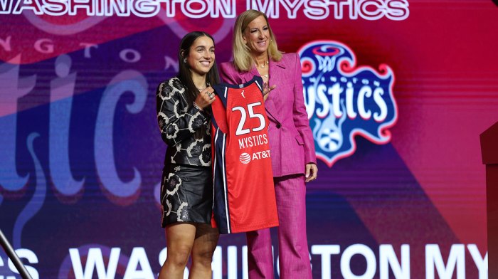 Georgia Amoore poses with WNBA commissioner Cathy Engelbert after being selected with the number six overall pick to the Washington Mystics in the 2025 WNBA Draft at The Shed at Hudson Yards.