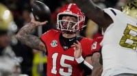 Georgia quarterback Carson Beck (15) throws the ball during the first half of a NCAA college football game against Georgia Tech in Athens, Ga., on Friday, Nov. 29, 2024.