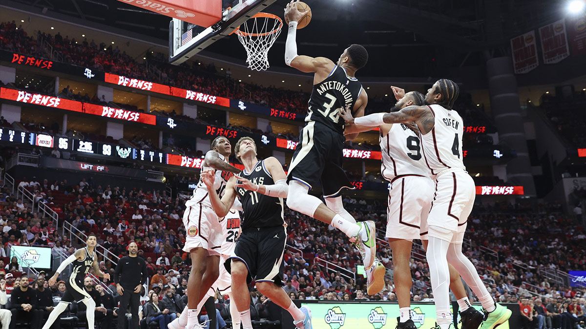 Milwaukee Bucks forward Giannis Antetokounmpo (34) attempts to control the ball during the fourth quarter against the Houston Rockets at Toyota Center.