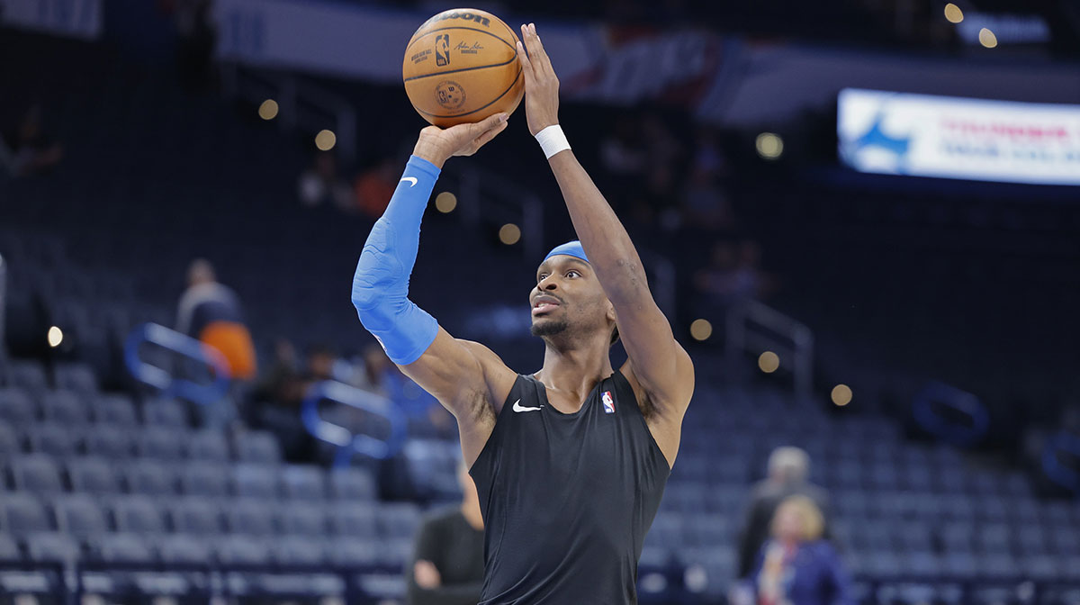 Oklahoma City Thunder guard Shai Gilgeous-Alexander warms up before the start of a game against the Detroit Pistons at Paycom Center.