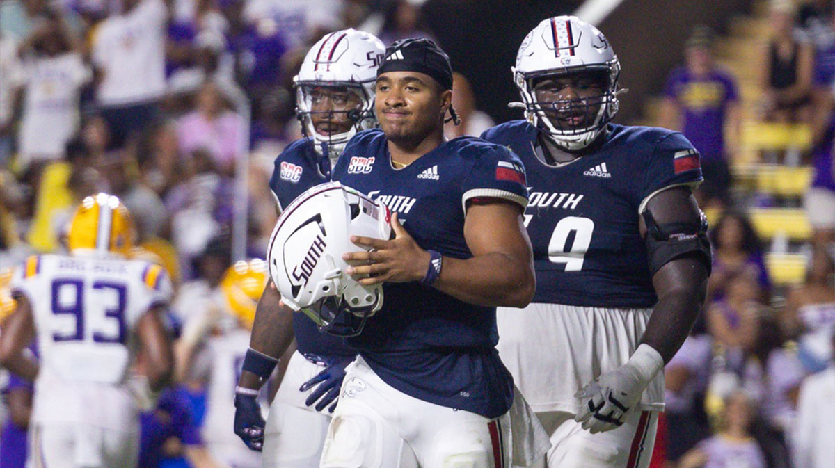South Alabama Jaguars quarterback Gio Lopez (7) loses his helmet on a play against the LSU Tigers during the second half at Tiger Stadium.