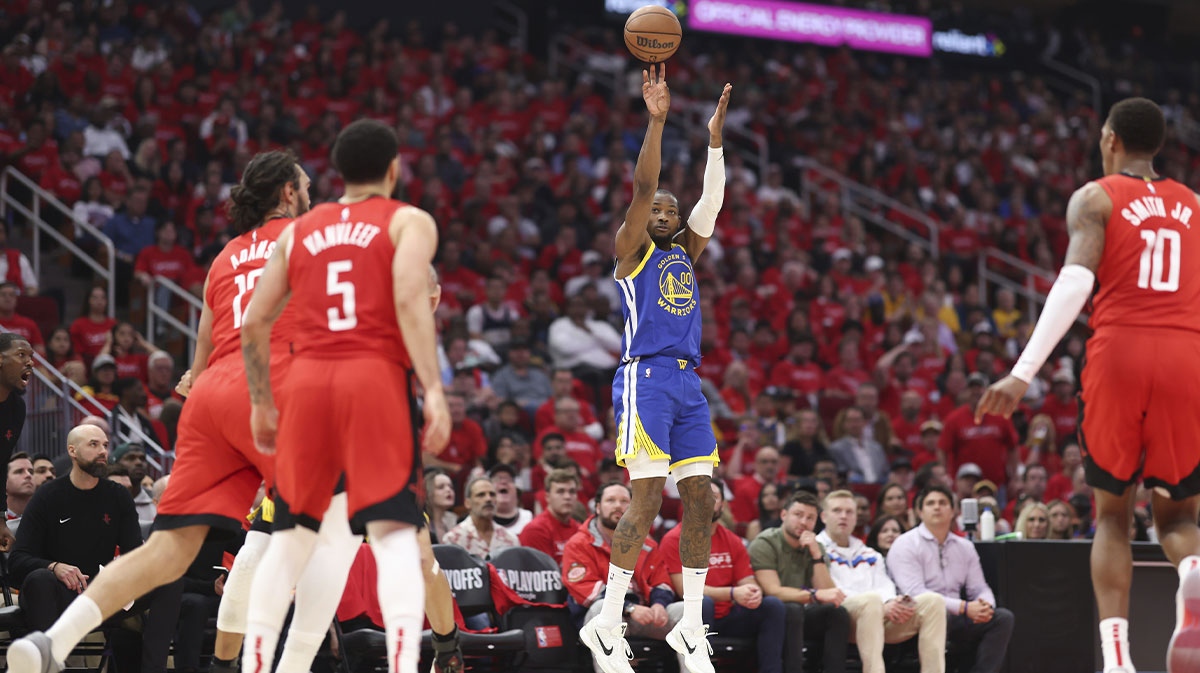 Golden State Warriors forward Jonathan Kuminga (00) shoots the ball during the second quarter during game two of the first round for the 2024 NBA Playoffs against the Houston Rockets at Toyota Center.