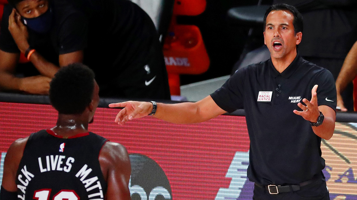 Miami Heat head coach Erik Spoelstra reacts as he talks with forward Bam Adebayo (13) during the second half of game four of the second round of the 2020 NBA Playoffs against the Milwaukee Bucks at ESPN Wide World of Sports Complex.