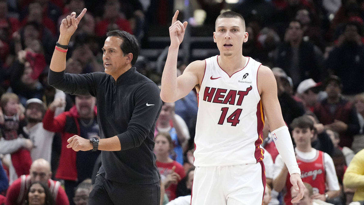 https://wp.clutchpoints.com/wp-content/uploads/2025/04/Heat-guard-Tyler-Herro-14-and-head-coach-Erik-Spoelstra-ask-for-a-replay.jpg