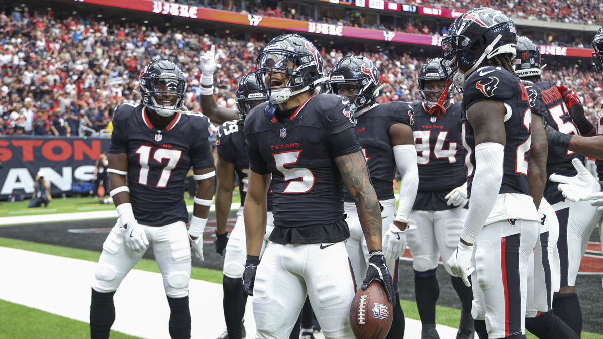 Houston Texans safety Jalen Pitre (5) celebrates after making an interception during the second quarter against the Indianapolis Colts at NRG Stadium.