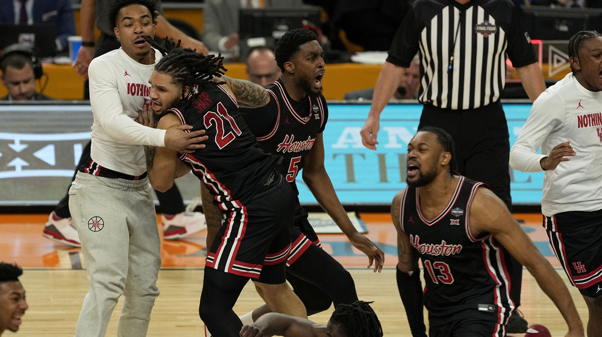 Houston Cougars guard Emanuel Sharp (21) reacts after defeating the Duke Blue Devils in the semifinals of the men's Final Four of the 2025 NCAA Tournament at Alamodome. Mandatory Credit: Scott Wachter-Imagn Images
