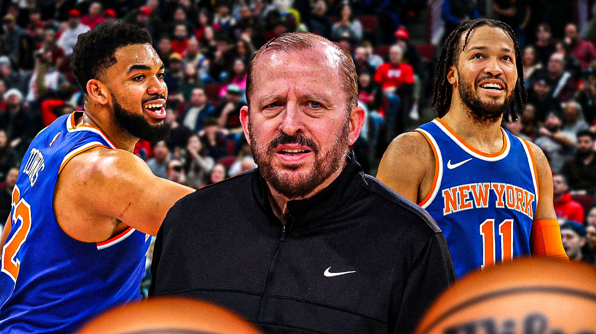 Coach Thibodeau smiling devilishly with Karl-Anthony Towns and Jalen Brunson celebrating