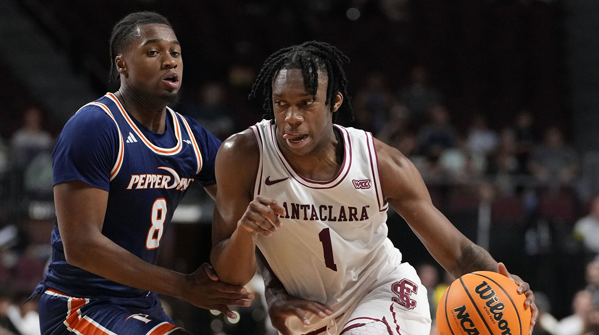 Santa Clara Broncos guard Tyeree Bryan (1) dribbles the basketball against Pepperdine Waves guard Zion Bethea (8) during the first half in the quarterfinal of the West Coast Conference tournament at Orleans Arena.