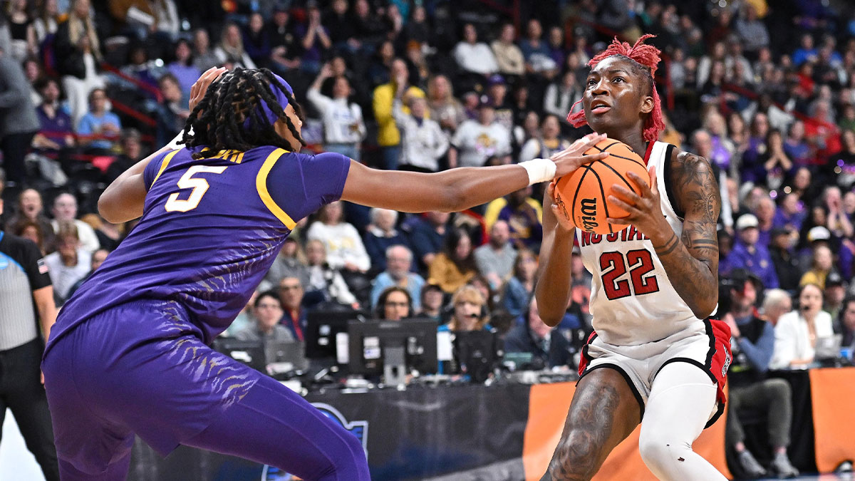 LSU Lady Tigers forward Sa'Myah Smith (5) knocks the ball away from NC State Wolfpack guard Saniya Rivers (22) during the second half of a Sweet 16 NCAA Tournament basketball game at Spokane Arena.