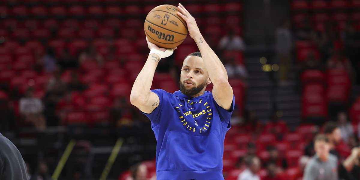 Stephen Curry splashing it from the logo ahead of Warriors-Rockets Game 2