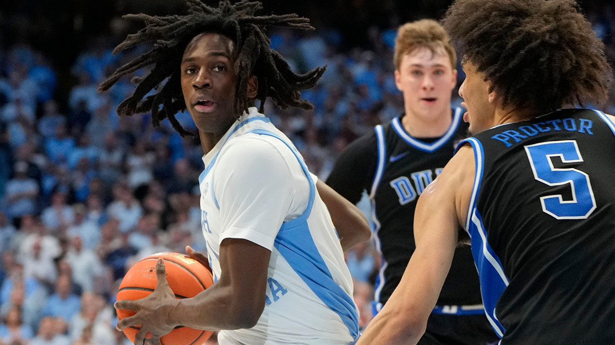North Carolina Tar Heels guard Ian Jackson (11) with the ball as Duke Blue Devils guard Tyrese Proctor (5) defends in the second half at Dean E. Smith Center.