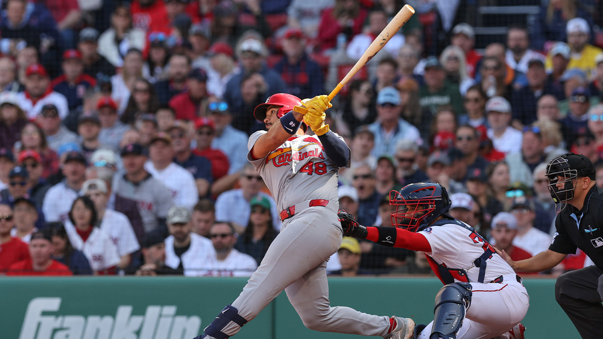 St. Louis Cardinals catcher Ivan Herrera (48) hits a three run home run during the fourth inning against the Boston Red Sox at Fenway Park.