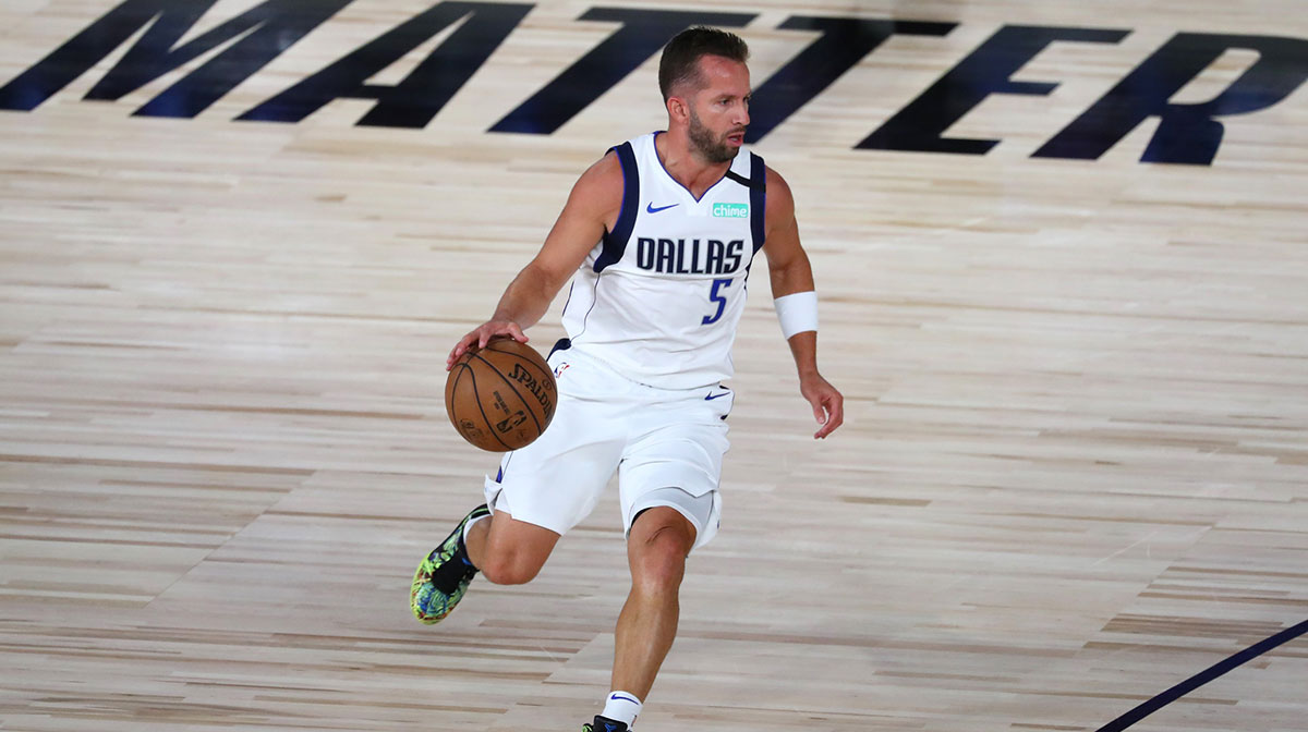 Dallas Mavericks guard J.J. Barea (5) brings the ball upcourt against the Sacramento Kings during the first half of a NBA basketball game in the HP Field House at the ESPN Wide World of Sports Complex.