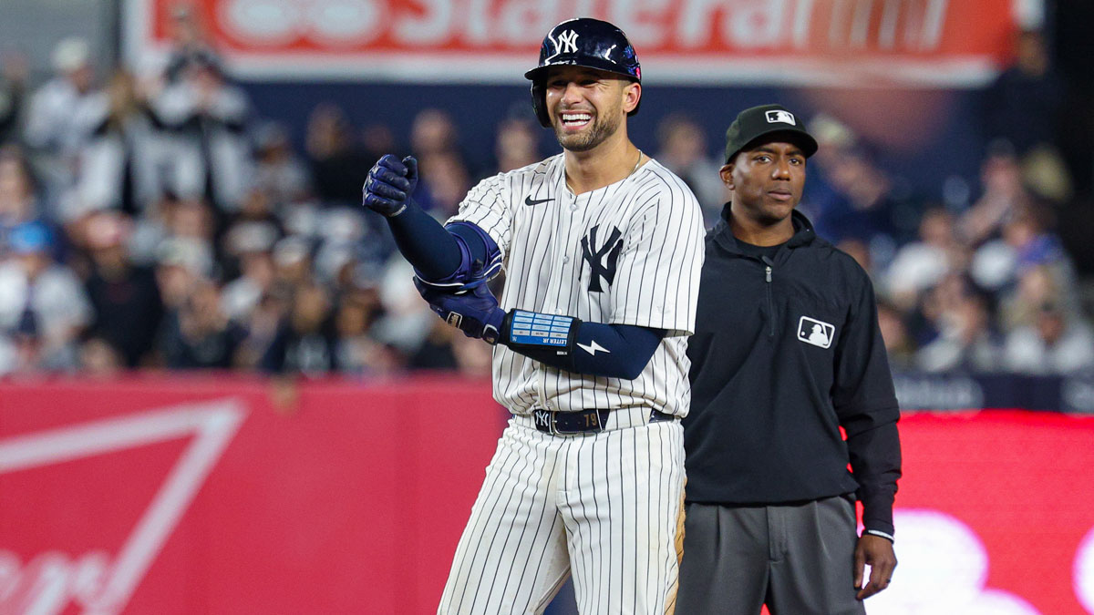 New York Yankees catcher J.C. Escarra (25) reacts after hitting a double during the seventh inning against the Arizona Diamondbacks at Yankee Stadium.