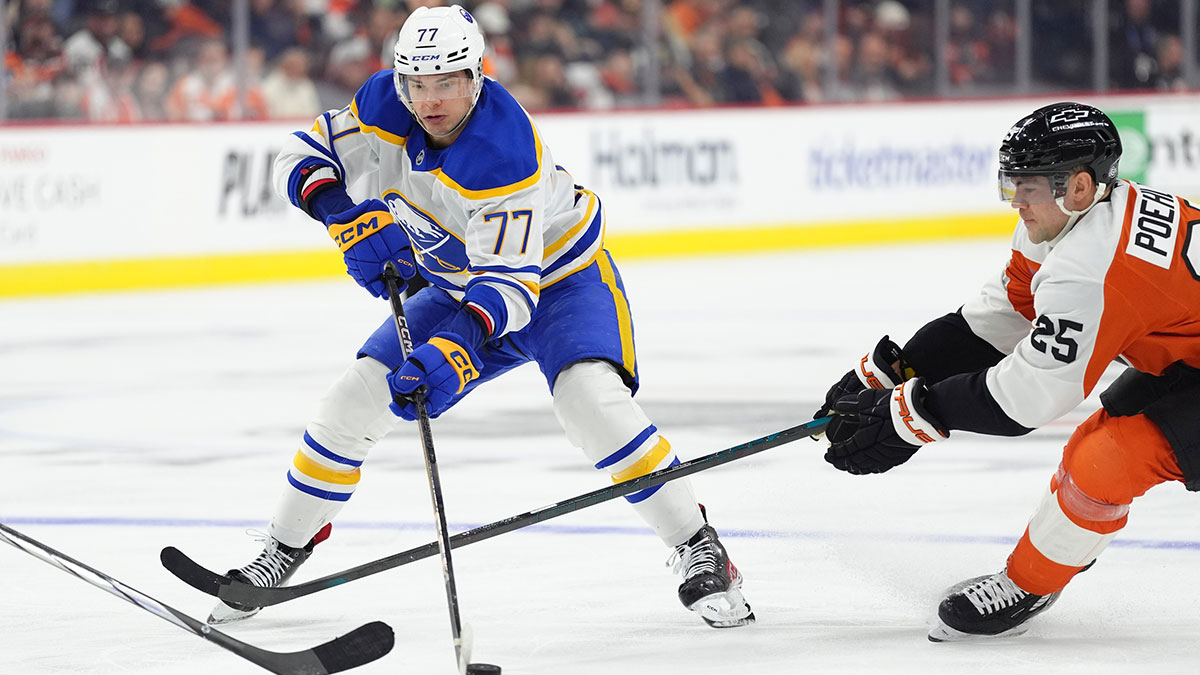 Buffalo Sabres right wing JJ Peterka (77) controls the puck against Philadelphia Flyers center Ryan Poehling (25) in the third period at Wells Fargo Center.