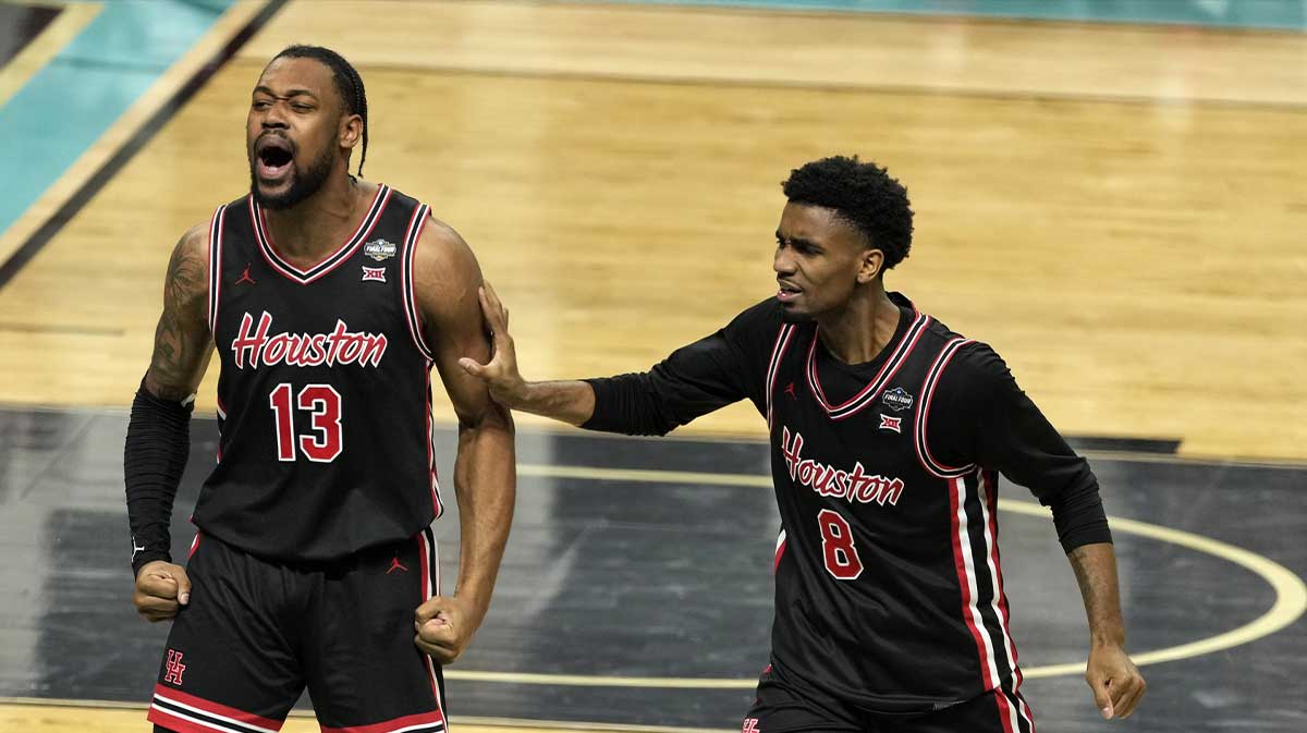 Houston Cougars forward J'Wan Roberts (13) and guard Mylik Wilson (8) react against the Duke Blue Devils during the second half in the semifinals of the men's Final Four of the 2025 NCAA Tournament at Alamodome. Mandatory Credit: Scott Wachter-Imagn Images
