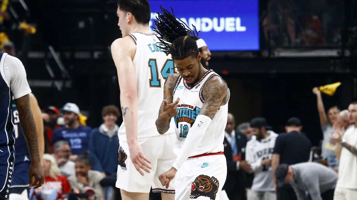 Memphis Grizzlies guard Ja Morant (12) reacts during the first quarter against the Dallas Mavericks at FedExForum.