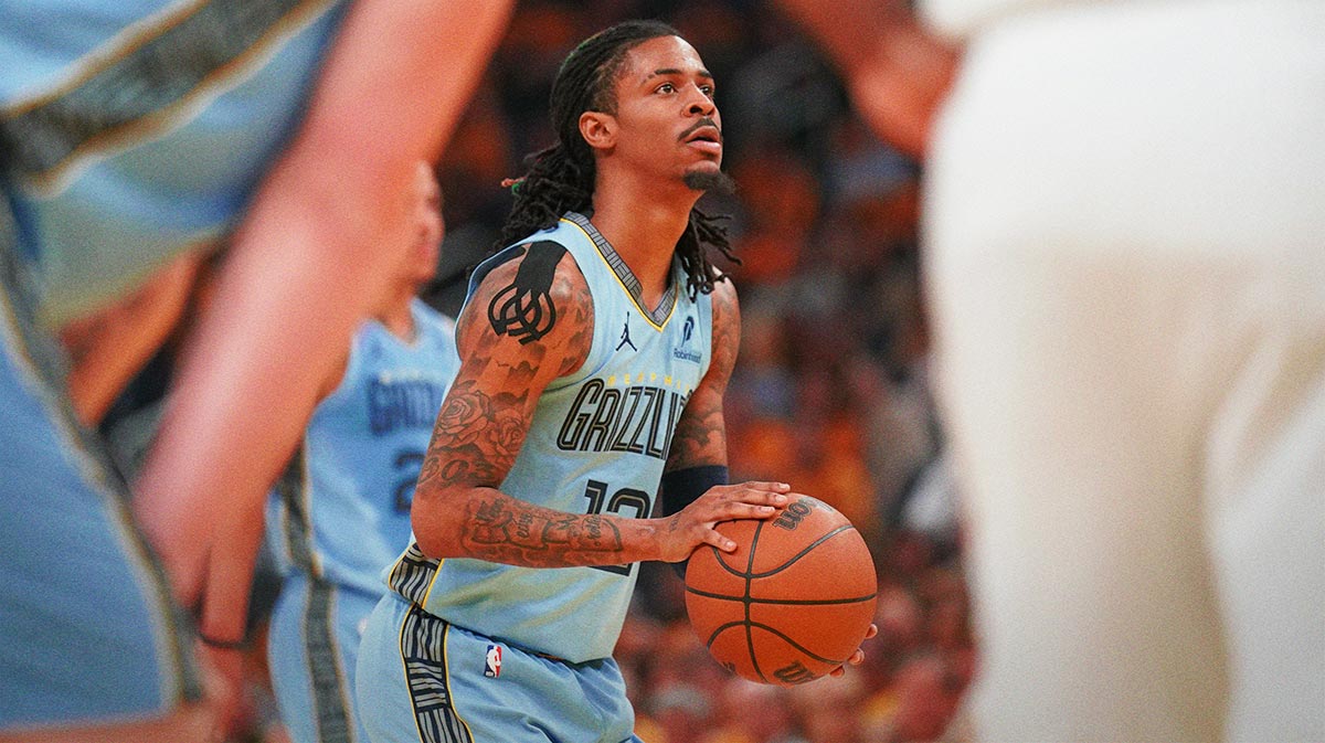 Memphis Grizzlies guard Ja Morant (12) shoots a free throw against the Golden State Warriors in the second quarter at the Chase Center.