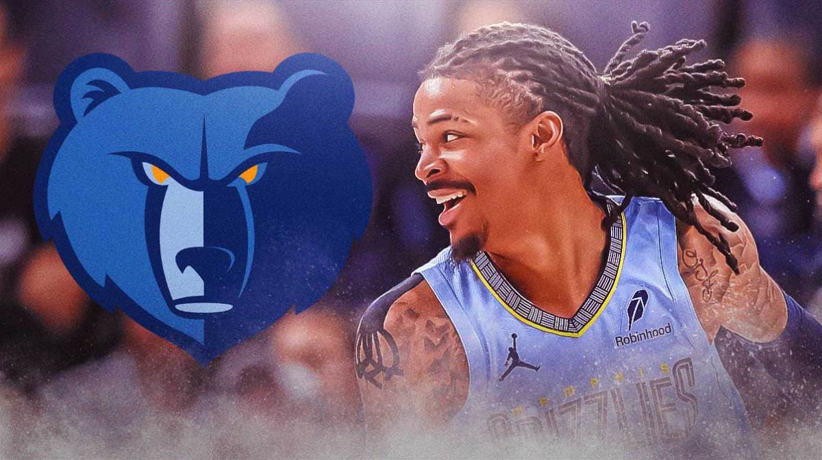Ja Morant smiling with the Grizzlies logo next to him