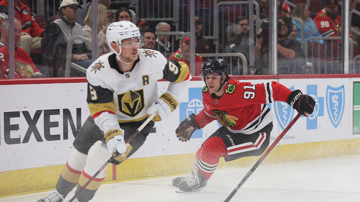 Chicago Blackhawks center Frank Nazar (91) and Vegas Golden Knights center Jack Eichel (9) battle for control of the puck during the first period at United Center.